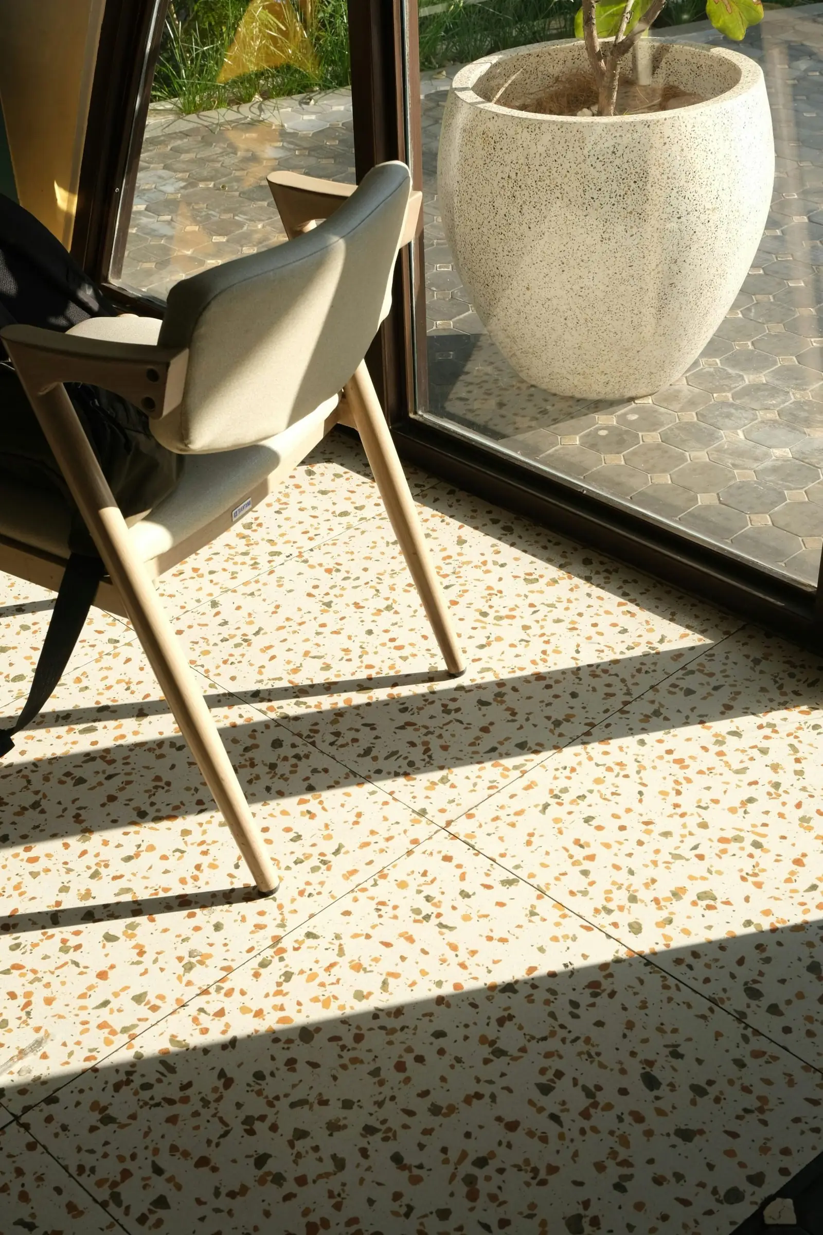 Warm cream terrazzo floor in afternoon sun